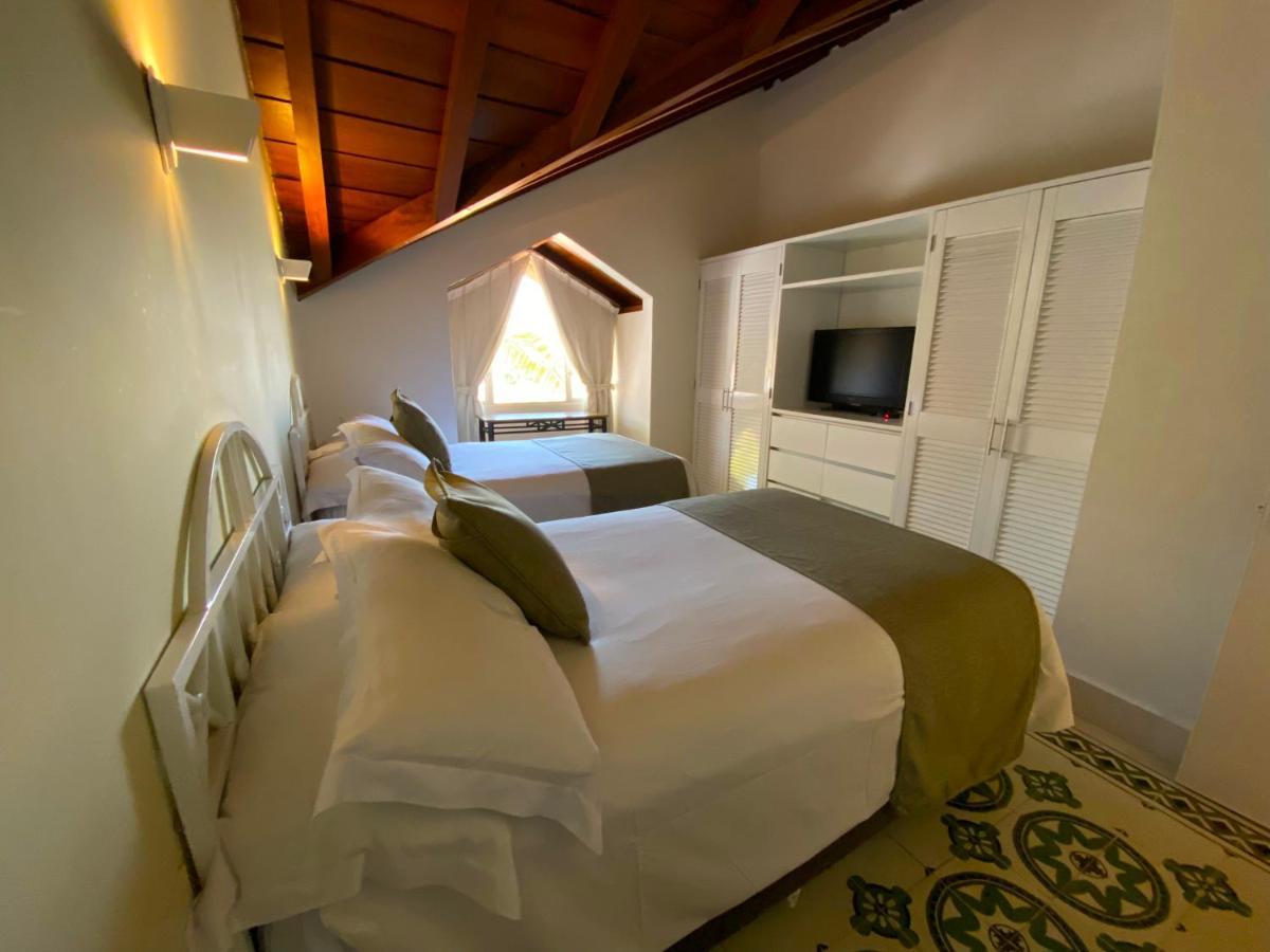 Hotel Las Americas Casa De Playa Картахена Экстерьер фото A room at the hotel