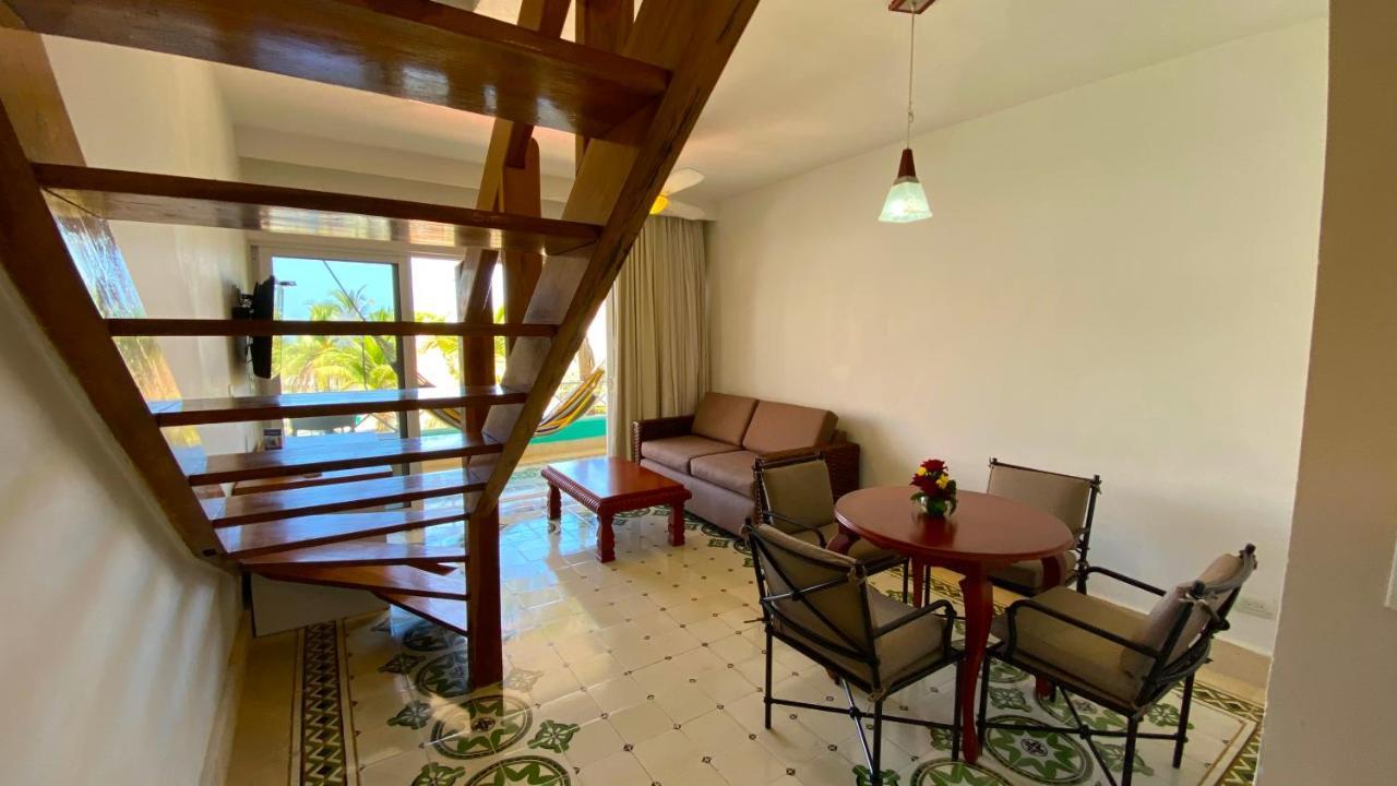 Hotel Las Americas Casa De Playa Картахена Экстерьер фото A living room in a typical apartment at the resort