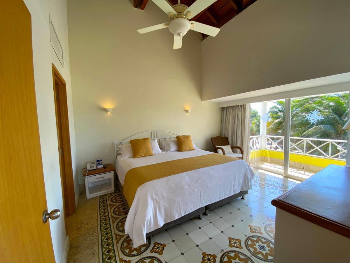 Hotel Las Americas Casa De Playa Картахена Экстерьер фото A bedroom at the hotel